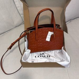 Coach 51665 Charlie carryall bag signature deboss leather bag.